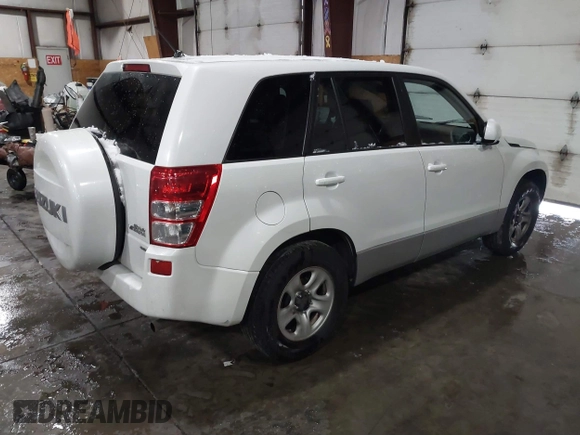 2011 Suzuki Grand Vitara Premium z VIN JS3TD0D24B4101861, wystawiony jako IAAI lot #41620401 z przebiegiem 151 034 mil mil oraz . Historia ofert i sprzedaży dostępna na DreamBid. Obrazek 4.