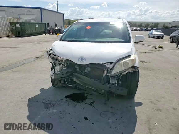 2014 Toyota Sienna LE AAS z VIN 5TDKK3DC1ES468896, wystawiony jako Copart lot #60520405 z przebiegiem 239 779 mil mil oraz Szkoda całkowita • Salvage title. Historia ofert i sprzedaży dostępna na DreamBid. Obrazek 14.
