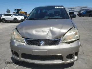2006 Suzuki Aerio Premium z VIN JS2RA62S165300427, wystawiony jako Copart lot #57363605 z przebiegiem 141 824 mil mil oraz Szkoda całkowita • Salvage title. Historia ofert i sprzedaży dostępna na DreamBid. Obrazek 5.