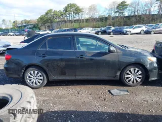 2013 Toyota Corolla L with VIN 2T1BU4EE0DC967387, listed as a IAAI auction lot 42142298 with Not Provided miles. Bid and sale history available at carsss.com. Image 12.