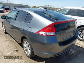 2010 Honda Insight EX with VIN JHMZE2H75AS008489, listed as a IAAI auction lot 42124780 with 226,100 mi miles and . Bid and sale history available at DreamBid. Image 3.