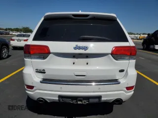 2015 Jeep Grand Cherokee Overland with VIN 1C4RJFCM4FC618516, listed as a Copart auction lot 58671455 with 221,550 mi miles and Clean title. Bid and sale history available at DreamBid. Image 6.