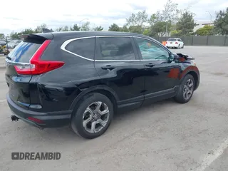2019 Honda CR-V EX with VIN 5J6RW1H56KA030445, listed as a IAAI auction lot 42043513 with 137,087 mi miles. Bid and sale history available at carsss.com. Image 4.
