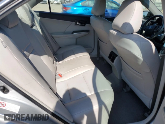 2012 Toyota Camry XLE z VIN 4T1BD1FK6CU010214, wystawiony jako Copart lot #57690544 z przebiegiem 77 943 mil mil oraz Szkoda całkowita • Salvage title. Historia ofert i sprzedaży dostępna na DreamBid. Obrazek 10.