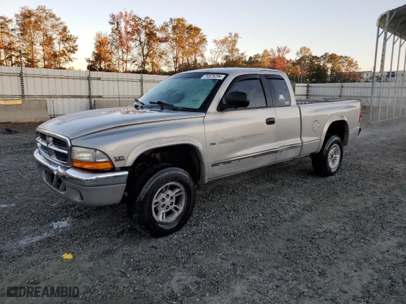 2000 Dodge Dakota Sport with VIN 1B7GG22N6YS591885, listed as a Copart auction lot 76525294 with 281,690 mi miles and Salvage Title. Bid and sale history available at carsss.com. Image 1.