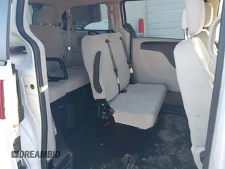 2019 Dodge Grand Caravan SE with VIN 2C7WDGBG7KR803126, listed as a IAAI auction lot 40835937 with 63,100 mi miles and . Bid and sale history available at DreamBid. Image 8.
