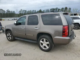 2011 Chevrolet Tahoe LS with VIN 1GNSCAE09BR138852, listed as a Copart auction lot 49165595 with 207,548 mi miles and Salvage title. Bid and sale history available at DreamBid. Image 2.
