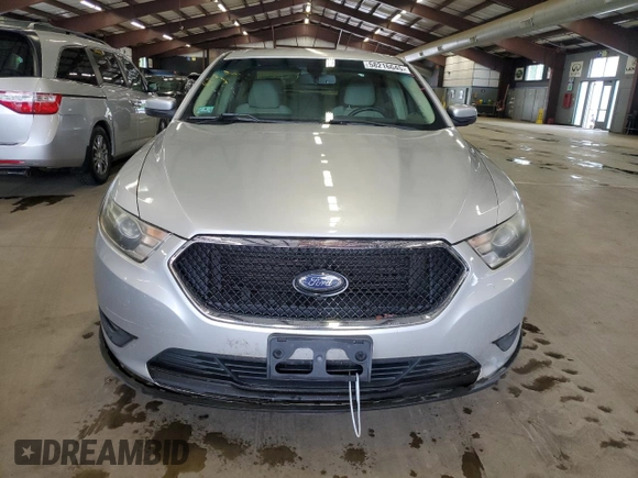 2014 Ford Taurus SEL z VIN 1FAHP2E86EG128370, wystawiony jako Copart lot #58216645 z przebiegiem 95 488 mil mil oraz Czysty tytuł • Clean title. Historia ofert i sprzedaży dostępna na DreamBid. Obrazek 5.
