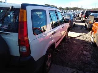 2004 Honda CR-V LX with VIN SHSRD68594U205802, listed as a IAAI auction lot 41222295 with 228,088 mi miles and . Bid and sale history available at DreamBid. Image 4.