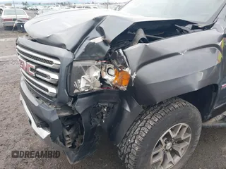 2016 GMC Canyon 4WD SLE with VIN 1GTG6CE37G1282630, listed as a IAAI auction lot 41153472 with 57,809 mi miles. Bid and sale history available at carsss.com. Image 6.