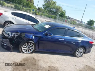 2018 Kia Optima EX with VIN 5XXGU4L32JG261985, listed as a IAAI auction lot 42083868 with 33,264 mi miles and . Bid and sale history available at carsss.com. Image 14.