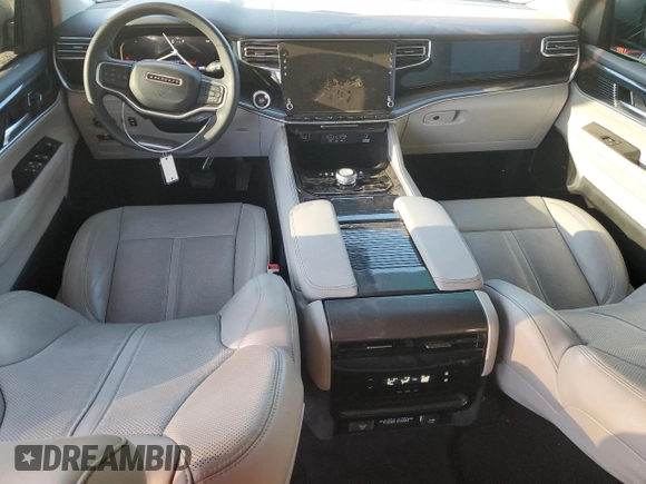 2022 Jeep Grand Wagoneer with VIN 1C4SJUAT4NS181525, listed as a Copart auction lot 72980394 with 32,714 mi miles and Salvage title. Bid and sale history available at DreamBid. Image 8.