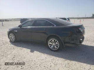 2015 Ford Taurus Limited with VIN 1FAHP2F83FG106102, listed as a Copart auction lot 49819005 with 100,925 mi miles and Salvage Title. Bid and sale history available at DreamBid. Image 2.