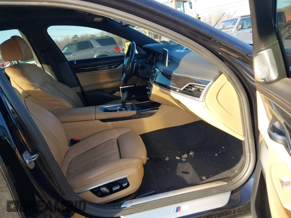 2017 BMW 7 Series 750i with VIN WBA7F0C34HGM21805, listed as a IAAI auction lot 41446797 with 88,753 mi miles and . Bid and sale history available at DreamBid. Image 5.