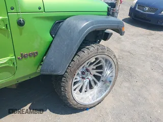 2018 Jeep Wrangler Sport with VIN 1C4GJXAG1JW271695, listed as a IAAI auction lot 42472603 with 105,460 mi miles and . Bid and sale history available at DreamBid. Image 20.