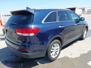 2016 Kia Sorento LX with VIN 5XYPG4A37GG145552, listed as a IAAI auction lot 42014900 with 153,191 mi miles. Bid and sale history available at carsss.com. Image 4.