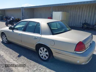 1999 Ford Crown Victoria z VIN 2FAFP73W7XX179492, wystawiony jako IAAI lot #42188954 z przebiegiem 137 299 mil mil oraz . Historia ofert i sprzedaży dostępna na DreamBid. Obrazek 3.