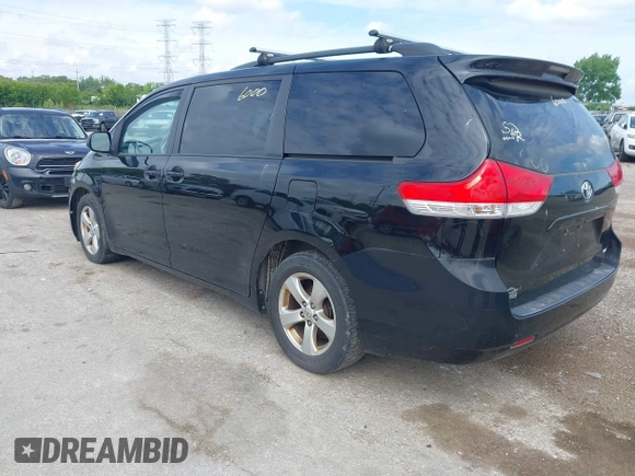 2013 Toyota Sienna LE AAS with VIN 5TDKK3DC3DS392029, listed as a IAAI auction lot 42366000 with 199,237 mi miles and . Bid and sale history available at DreamBid. Image 3.