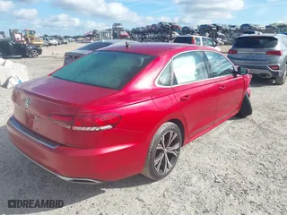 2021 Volkswagen Passat 2.0T SE with VIN 1VWSA7A30MC007748, listed as a IAAI auction lot 41843136 with 34,467 mi miles. Bid and sale history available at carsss.com. Image 4.