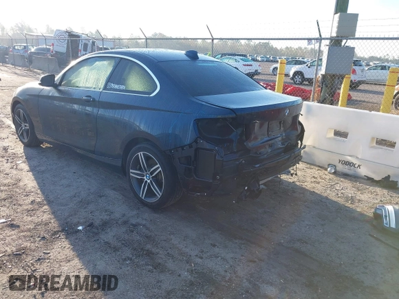 2017 BMW 2 Series 230i with VIN WBA2F9C3XHV983993, listed as a IAAI auction lot 41790242 with 76,620 mi miles. Bid and sale history available at carsss.com. Image 3.