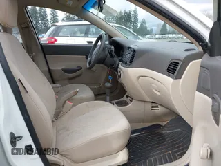2007 Hyundai Accent GLS with VIN KMHCN46C67U097159, listed as a IAAI auction lot 41913373 with 103,303 mi miles. Bid and sale history available at carsss.com. Image 5.