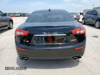 2014 Maserati Ghibli S Q4 with VIN ZAM57RTA8E1097777, listed as a Copart auction lot 59604665 with 86,135 mi miles and Salvage title. Bid and sale history available at DreamBid. Image 6.