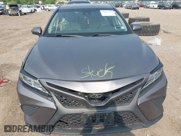 2018 Toyota Camry LE z VIN 4T1B11HK7JU033701, wystawiony jako IAAI lot #42417229 z przebiegiem 49 977 mil mil oraz . Historia ofert i sprzedaży dostępna na DreamBid. Obrazek 12.