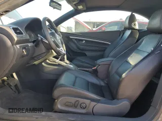 2012 Volkswagen Eos Komfort с VIN WVWBW7AH1CV006501, выставлен на аукционе Copart как лот 84711084 с пробегом 106 113 миль миль и Списание • Salvage title. История ставок и продаж доступна на DreamBid. Изображение 7.