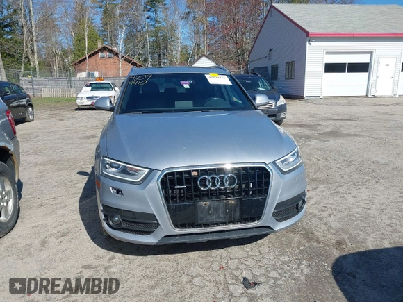 2015 Audi Q3 2.0T Premium Plus with VIN WA1EFCFSXFR010015, listed as a IAAI auction lot 42099410 with 142,117 mi miles. Bid and sale history available at carsss.com. Image 12.
