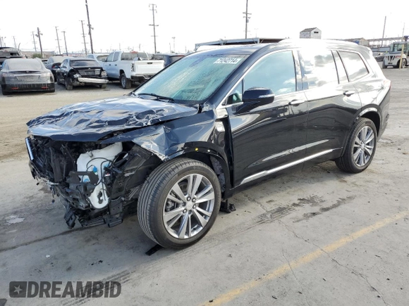 2023 Cadillac XT6 FWD Premium Luxury with VIN 1GYKPCRS9PZ117215, listed as a Copart auction lot 71242714 with 29,162 mi miles and Salvage Title. Bid and sale history available at carsss.com. Image 1.