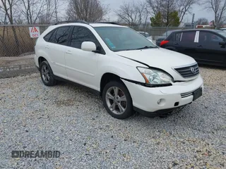 2007 Lexus RX 400h with VIN JTJGW31U572004833, listed as a IAAI auction lot 41938575 with 221,084 mi miles and . Bid and sale history available at DreamBid. Image 1.