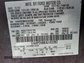 2018 Ford Taurus SEL with VIN 1FAHP2H88JG103282, listed as a Copart auction lot 61020965 with 164,172 mi miles and Clean title. Bid and sale history available at DreamBid. Image 12.