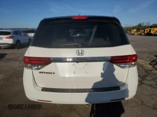 2014 Honda Odyssey EX-L with VIN 5FNRL5H61EB005740, listed as a Copart auction lot 54663595 with 118,971 mi miles and Salvage Title. Bid and sale history available at DreamBid. Image 6.