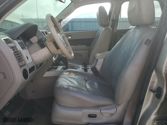 2010 Mercury Mariner Premier with VIN 4M2CN8H73AKJ06036, listed as a Copart auction lot 77542084 with 240,377 mi miles and Salvage Title. Bid and sale history available at carsss.com. Image 7.