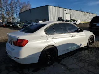2014 BMW 3 Series 335i with VIN WBA3A9C50EF479026, listed as a Copart auction lot 42343485 with 115,192 mi miles and Clean Title. Bid and sale history available at carsss.com. Image 3.