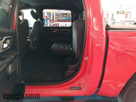 2023 Ram 1500 Big Horn z VIN 1C6RRFFG9PN561001, wystawiony jako IAAI lot #42575762 z przebiegiem 42 164 mil mil oraz . Historia ofert i sprzedaży dostępna na DreamBid. Obrazek 17.