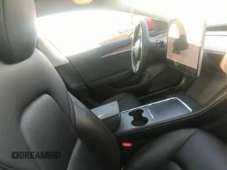 2022 Tesla Model 3 Long Range with VIN 5YJ3E1EB4NF171972, listed as a IAAI auction lot 42026031 with 40,489 mi miles and . Bid and sale history available at DreamBid. Image 5.