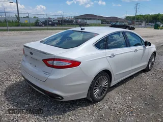 2013 Ford Fusion Titanium with VIN 3FA6P0K93DR140685, listed as a IAAI auction lot 42541546 with 132,465 mi miles and . Bid and sale history available at DreamBid. Image 4.