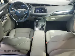 2023 Cadillac XT4 FWD Luxury with VIN 1GYAZAR4XPF104311, listed as a Copart auction lot 46891635 with 28,972 mi miles and Non repairable. Bid and sale history available at DreamBid. Image 8.