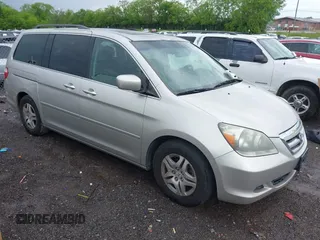2007 Honda Odyssey EX-L with VIN 5FNRL38787B455417, listed as a IAAI auction lot 42104303 with 214,482 mi miles and . Bid and sale history available at DreamBid. Image 1.