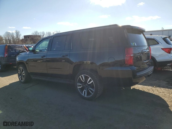 2020 Chevrolet Suburban Premier with VIN 1GNSKJKJ3LR221968, listed as a Copart auction lot 50227105 with 82,539 mi miles and Salvage Title. Bid and sale history available at carsss.com. Image 2.