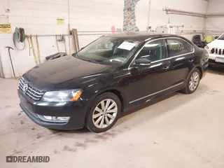 2013 Volkswagen Passat SEL Premium with VIN 1VWCP7A37DC068954, listed as a IAAI auction lot 42019750 with 127,943 mi miles. Bid and sale history available at carsss.com. Image 2.