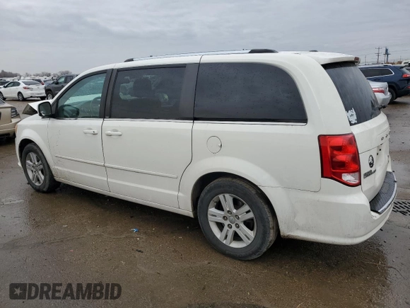 2013 Dodge Grand Caravan Crew with VIN 2C4RDGDG5DR740098, listed as a Copart auction lot 84491644 with 146,400 mi miles and Salvage Title. Bid and sale history available at DreamBid. Image 2.