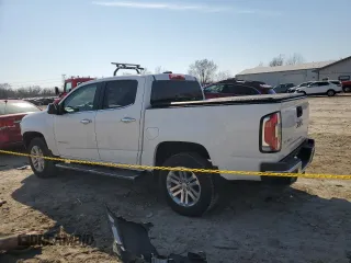 2015 GMC Canyon 2WD SLT with VIN 1GTG5CE36F1249183, listed as a Copart auction lot 47524815 with 99,616 mi miles and Salvage Title. Bid and sale history available at carsss.com. Image 2.