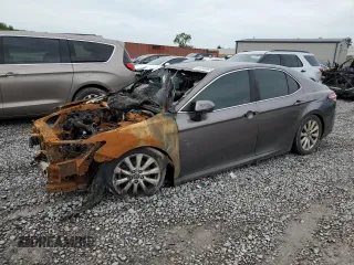 2018 Toyota Camry LE с VIN 4T1B11HK6JU573623, выставлен на аукционе Copart как лот 61994865 с пробегом Не указан миль и Списание • Salvage title. История ставок и продаж доступна на DreamBid. Изображение 1.