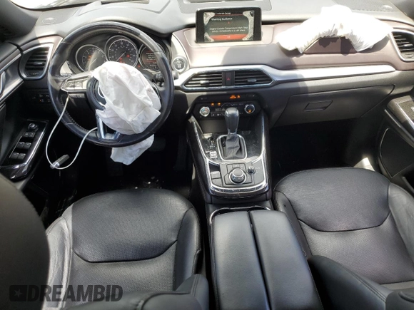 2016 Mazda CX-9 Grand Touring с VIN JM3TCADY2G0121026, выставлен на аукционе Copart как лот 60518105 с пробегом 104 923 миль миль и Списание • Salvage title. История ставок и продаж доступна на DreamBid. Изображение 8.