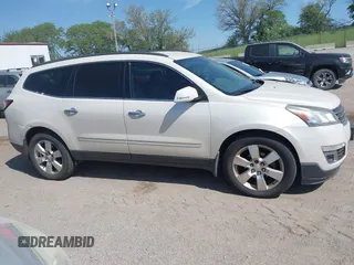 2013 Chevrolet Traverse LTZ z VIN 1GNKVLKD8DJ107168, wystawiony jako IAAI lot #42242078 z przebiegiem 271 640 mil mil oraz . Historia ofert i sprzedaży dostępna na DreamBid. Obrazek 14.