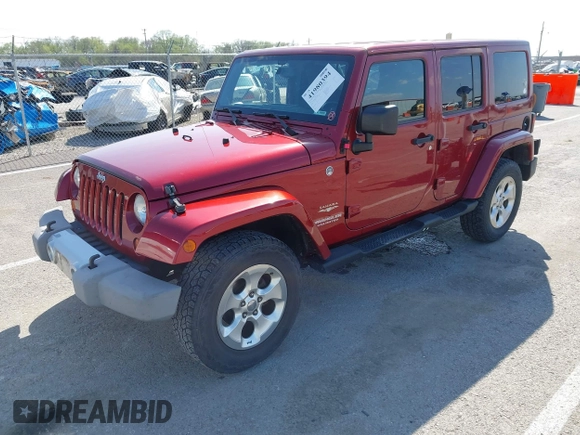 2013 Jeep Wrangler Unlimited Sahara с VIN 1C4BJWEG5DL569977, выставлен на аукционе IAAI как лот 41980394 с пробегом 145 571 миль миль и . История ставок и продаж доступна на DreamBid. Изображение 2.