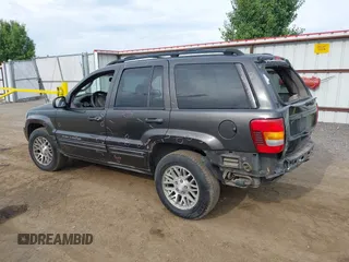 2004 Jeep Grand Cherokee Limited with VIN 1J4GW58N54C372118, listed as a IAAI auction lot 42526424 with 187,430 mi miles and . Bid and sale history available at DreamBid. Image 3.