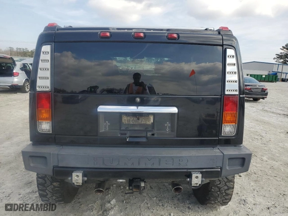 2004 Hummer H2 with VIN 5GRGN23U54H118187, listed as a Copart auction lot 76258264 with NaN miles and Salvage Title. Bid and sale history available at carsss.com. Image 6.